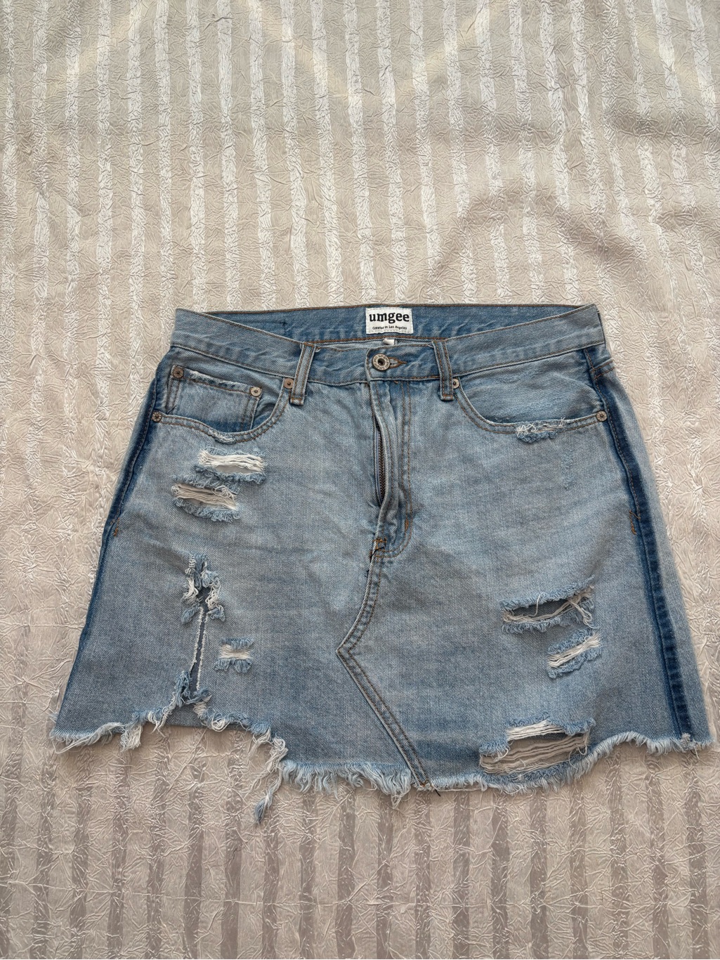 Umgee Light Blue Distressed Denim Mini Skirt With Frayed Hem